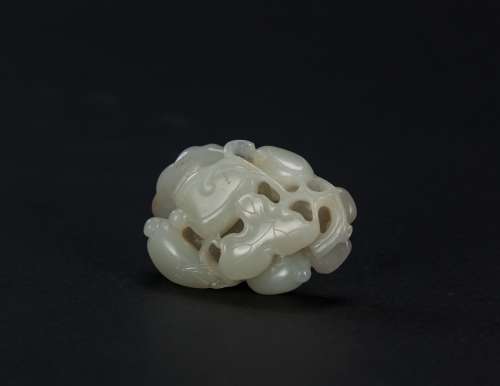 Qing - A White Jade With Russet Skin Carved Melon Pendand