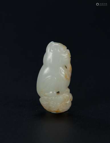 Qing - A Russet White Jade Carved Lion