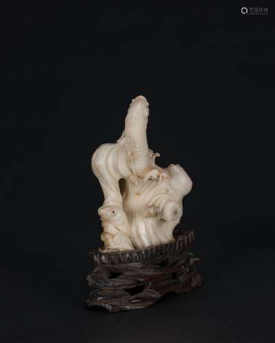Qing - A White Coral Carved Koi (Wood Stand)<br>H:7.6 cm (3 in)