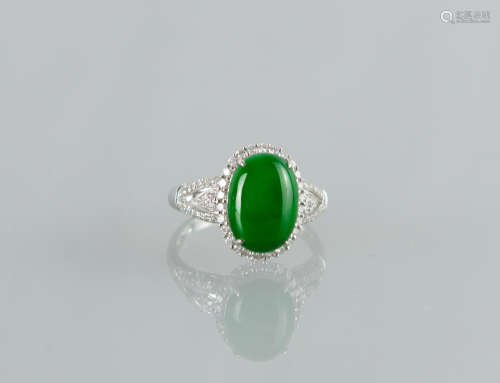 A Glassy Emerald Green Jadeite And Diamond Lady’s ring