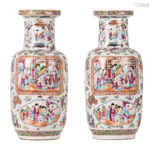 A pair of 19thC Chinese famille rose rouleau vases, the panels painted with courtscenes, H 38,5 cm (bottomcrack)