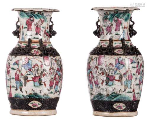 A pair of Chinese famille rose stoneware vase, overall decorated with warriors, relief decorated, marked, 19thC, H 35,5 cm