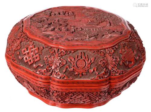 A large Chinese lacquer box with cover, depicting a landscape with figures and the eight symbols of Buddhism, Diameter 37,5 cm - H 18 cm