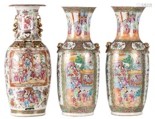 A pair of Chinese Canton famille rose vases, decorated with court scenes, 19thC (restoration and hairline); added a ditto vase (restoration and crack), H 61,5 - 62,5 cm