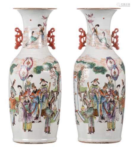A pair of Chinese polychrome vases, decorated with an animated scene, flower branches and calligraphic texts, 19thC, H 58,5 cm