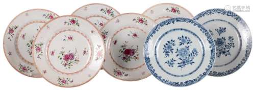 Five Chinese floral decorated famille rose plates, 18thC; added two ditto plates with floral blue and white decoration, Diameter 23 - 23,5 cm (negligible chips)