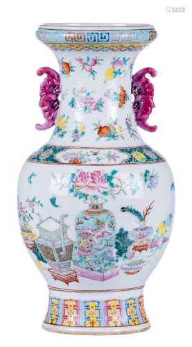 A Chinese famille rose vase, overall decorated with flower vases, antiquities and fruits, the handles bat shaped, 19thC, H 42,5 cm (crack to the bottom)