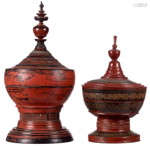 Two Burmese red lacquered pagoda shaped offering vessels and cover, 19th - 20thC, H 57 - 74 cm