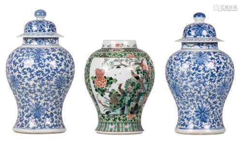 A pair of Chinese blue and white vases with covers; added a ditto famille verte vase, 19thC, H 35 - 46 cm (damage)