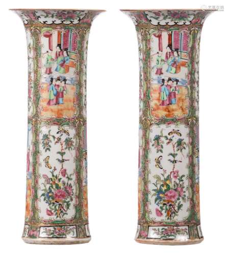 A pair of Chinese Canton famille rose cylindrical vases, decorated with court scenes and flower branches, 19thC, H 45 cm
