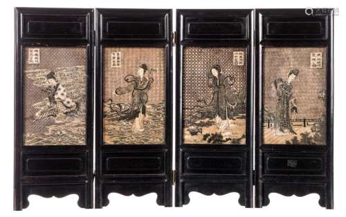 A Chinese black lacquered wooden table screen, the marble plaques polychrome and relief decorated with figures and calligraphic texts, 45,5 x 72,5 cm