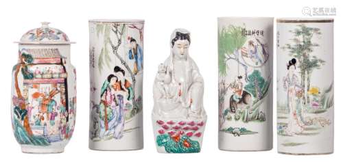 Three cylindrical polychrome vases, decorated with garden scenes, two marked; added a ditto vase and cover (marked) and a Guanyin, H 27 - 29 cm