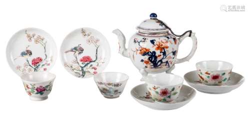 A pair of Chinese famille rose floral decorated cups and matching saucers, 18thC; added three ditto cups, a pair of saucers and a Chinese Imari teapot, H 3,5 - 4 cm / teapot H 13,5 cm