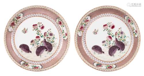 A pair of Chinese 'ruby-back' and famille rose dishes, decorated with quail in a landscape, Yongzheng, Diameter 21 - 21,5 cm