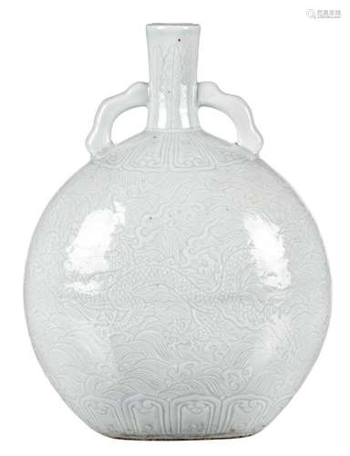 A Chinese light blue glazed moonflask, dragon relief decorated, H 29 cm