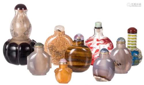Nine Chinese snuff bottles, glas and semi-precious stones, 19th and 20thC, H 3,5 - 11 cm