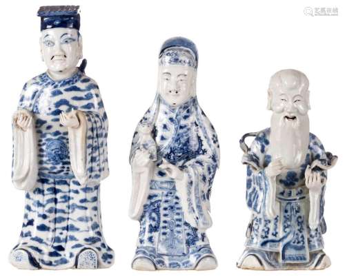 Three Chinese blue and white 'Fu Lu Shou Shing' figures, decorated with dragons, phoenixes and auspicious symbols, H 21 - 28 cm