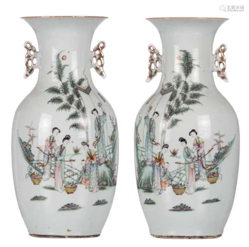 A pair of Chinese polychrome vases, decorated with gallant garden scenes and calligraphic texts, H 43 cm