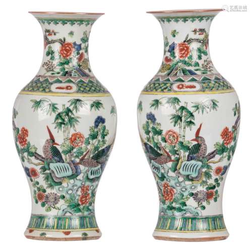 A pair of Chinese famille verte baluster shaped vases, overall decorated with birds and flower branches, 19thC, H 42 cm