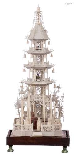 A Chinese ivory pagoda, given to the Xaverian Order by the Britain, parents of one of their pupils at the end of the 19thC; added a stone seal, H 41,5 cm, (documentation added)