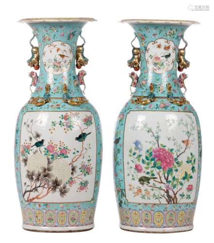 A pair of Chinese turquoise ground vases, overall decorated with birds on flower branches, 19thC, H 80,5 cm (crack and flaking of the glaze)