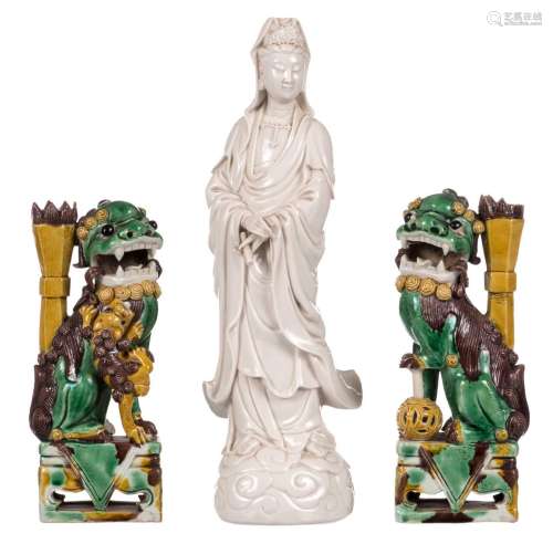 A pair of Chinese sancai incense burners modelled as temple guards, 19thC, H 20 cm; added a Blanc de Chine Guanyin, H 31,5 cm