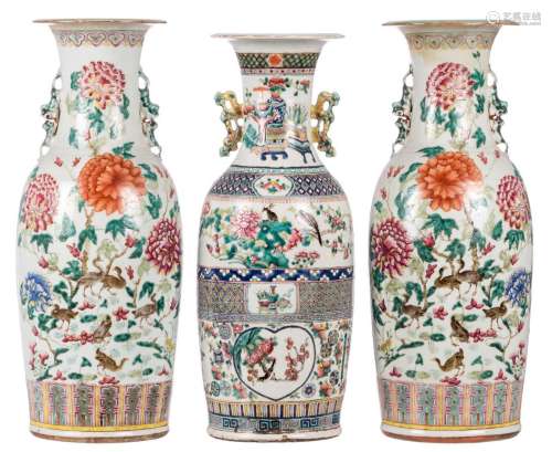 A pair of Chinese famille rose vases, overall decorated with birds on flower branches (restoration); added a ditto vase, 19thC, H 58,5 - 60,5 cm (hairline)
