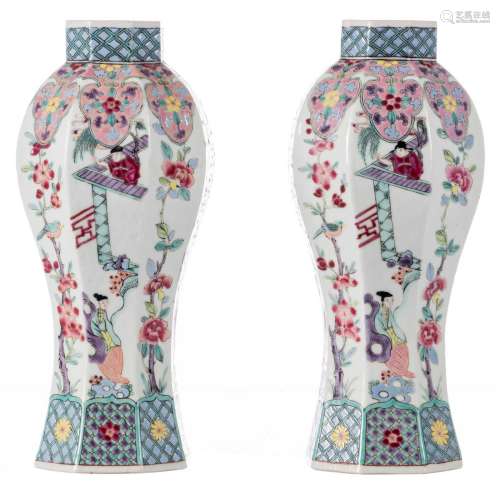 A pair of Chinese famille rose octagonal vases, decorated with animated scenes and floral motifs, marked Qianlong and period, H 27 cm