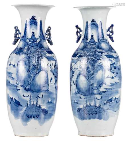 A pair of Chinese celadon ground blue and white decorated vases with figures in a mountainous landscape, 19thC, H 58,5 - 59,5 cm (crack)