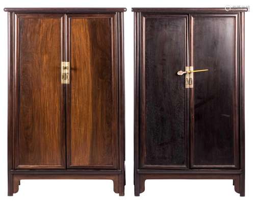 A pair of Chinese hardwood cabinets, H 124 - W 76 - D 45,5 cm