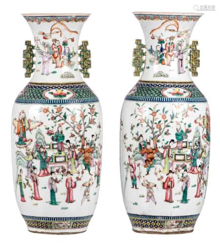A pair of Chinese famille rose vases, decorated with an animated scene, flower vases and antiquities, 19thC, H 58 cm