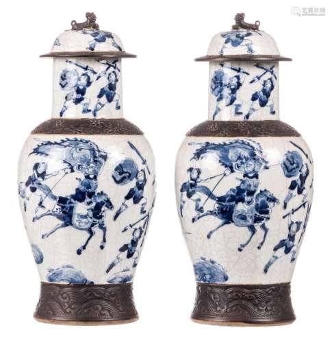 Two Chinese blue and white stoneware vases and covers, overall decorated with warriors, relief decoration, marked, 19thC, H 46 cm