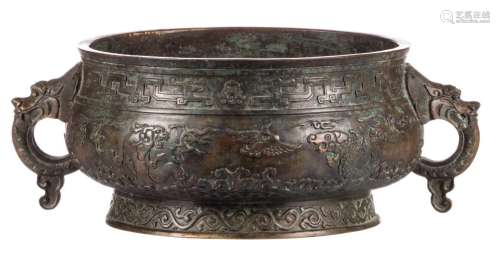 A Chinese archaic bronze vessel, relief decorated with mythical animals, with a Xuande mark, H 15 - Diameter 27 cm