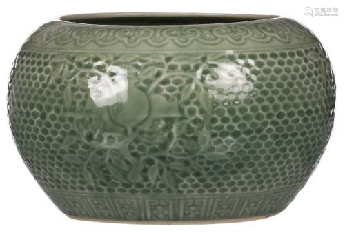 A Chinese green glazed monochrome floral relief decorated bowl, marked Qianlong, H 17 cm