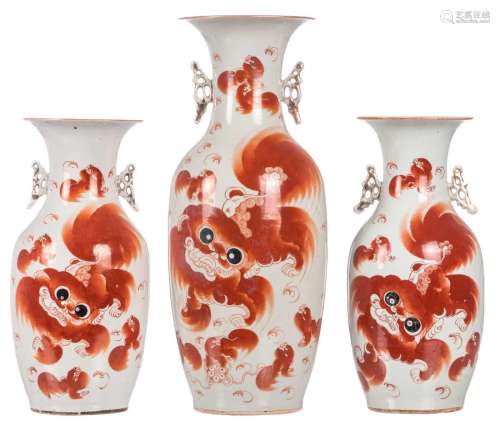 Three Chinese iron red decorated vases with Fu lions and calligraphic texts, one vase marked, 19thC, H 43 - 58 cm