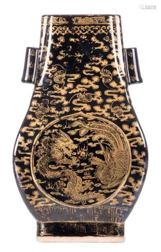 A Chinese quadrangular black ground Hu vase, gilt decorated with a dragon, a phoenix, a flaming pearl, bats and auspicious symbols, marked, H 31 cm