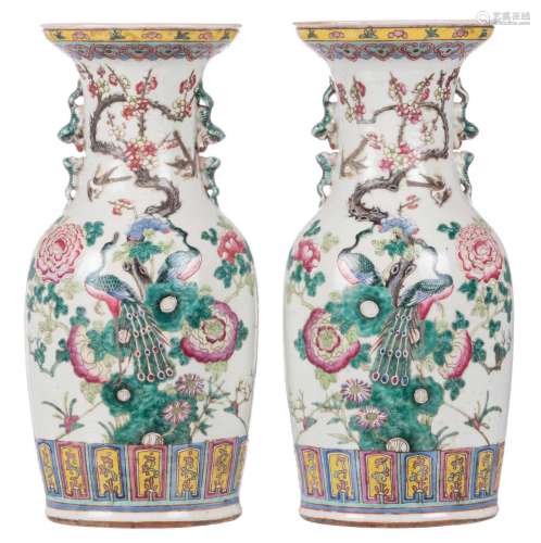 A pair of Chinese famille rose vases, decorated with phoenix, birds and flower branches, 19thC, H 44,5 cm