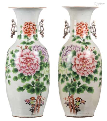 A pair of Chinese famille rose vases, decorated with peonies and calligraphic texts, H 58 cm