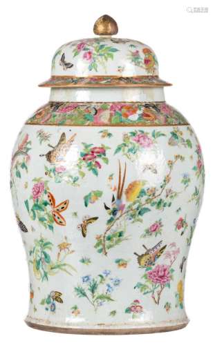 A Chinese famille rose vase and cover decorated with birds, butterflies and flower branches, 19thC, H 60,5 cm (restoration)