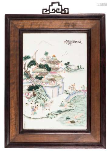 A Chinese polychrome porcelain plaque, decorated with figures in a landscape, signed and mounted in a wooden frame, 25,5 x 40 cm (without frame)