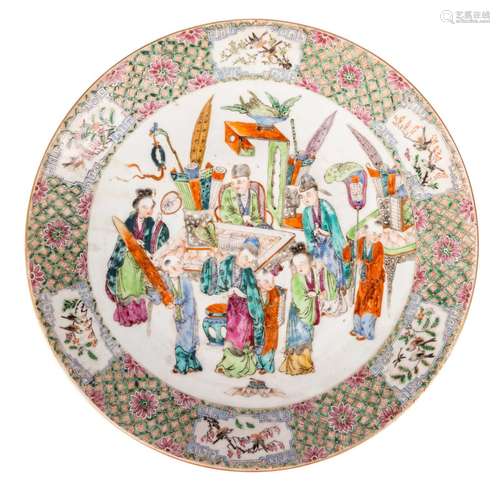 A Chinese polychrome dish, depicting a genrescene, 19thC, Diameter 35 cm