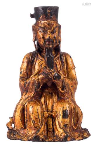 A Chinese polychrome and gilt lacquered bronze figure, depicting a literatus, on a matching wooden base, Ming, H 28 cm (restorations)