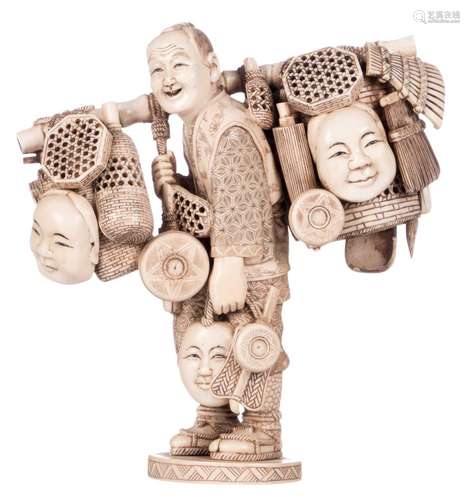 A Japanese ivory okimono, depicting a Nô-theatre masks street vendor, Meiji period, marked, H 21 cm