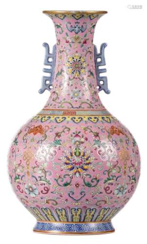 A Chinese pink ground famille rose bottle vase, floral decorated with bats and auspicious symbols, with a Daoguang mark, H 29 cm