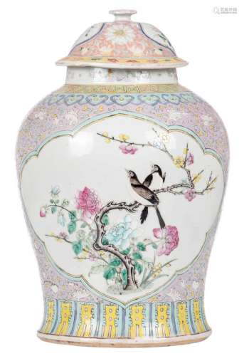 A Chinese polychrome decorated vase and cover, the roundels famille rose with birds on flower branches, 19thC, H 40 cm