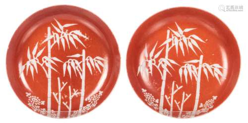 Two Chinese iron red dishes, decorated with bamboo and flower branches, Jiaqing marked, H 3 - 14,8 cm