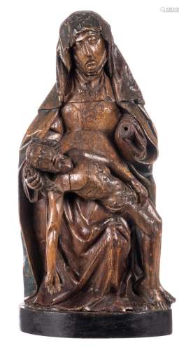 A carved wooden Pieta with traces of polyhrome paint, the Netherlands, 16thC, H 76,5 cm