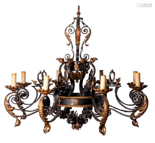 A wrought-iron eigth-light chandelier with gilt mounts, H 91 - Diameter 106 cm