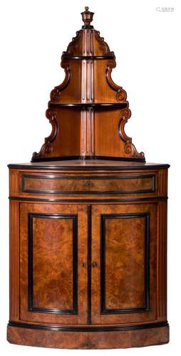 A mahogany and burl veneered corner cupboard, with some ebonised wooden details, third quarter of the 19thC, H 182 - W 87 - D 61 cm