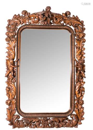 An imposing richly carved wooden mirror, mid 19thC, H 202 - W 137 cm